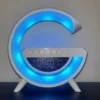 Lampe med trådløs oplader og Bluetooth højtaler